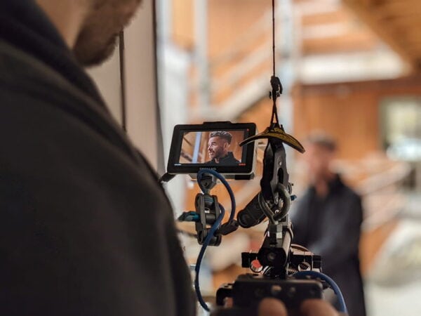 Camera monitor capturing interview footage during Move-In Multnomah video production